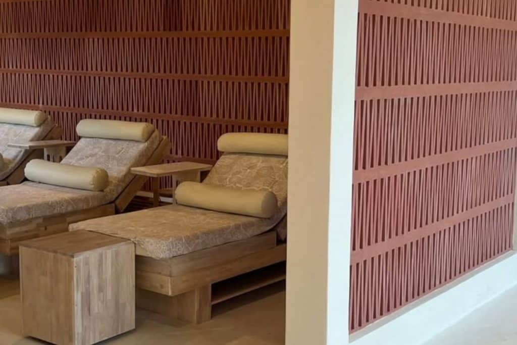 Minimalist massage room at Spring Spa Bingin with natural light