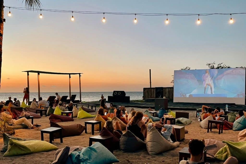 Outdoor beach cinema at sunset in Gili Trawangan