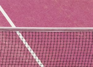 Close-up of pink padel court at The Ground in Uluwatu, Bali
