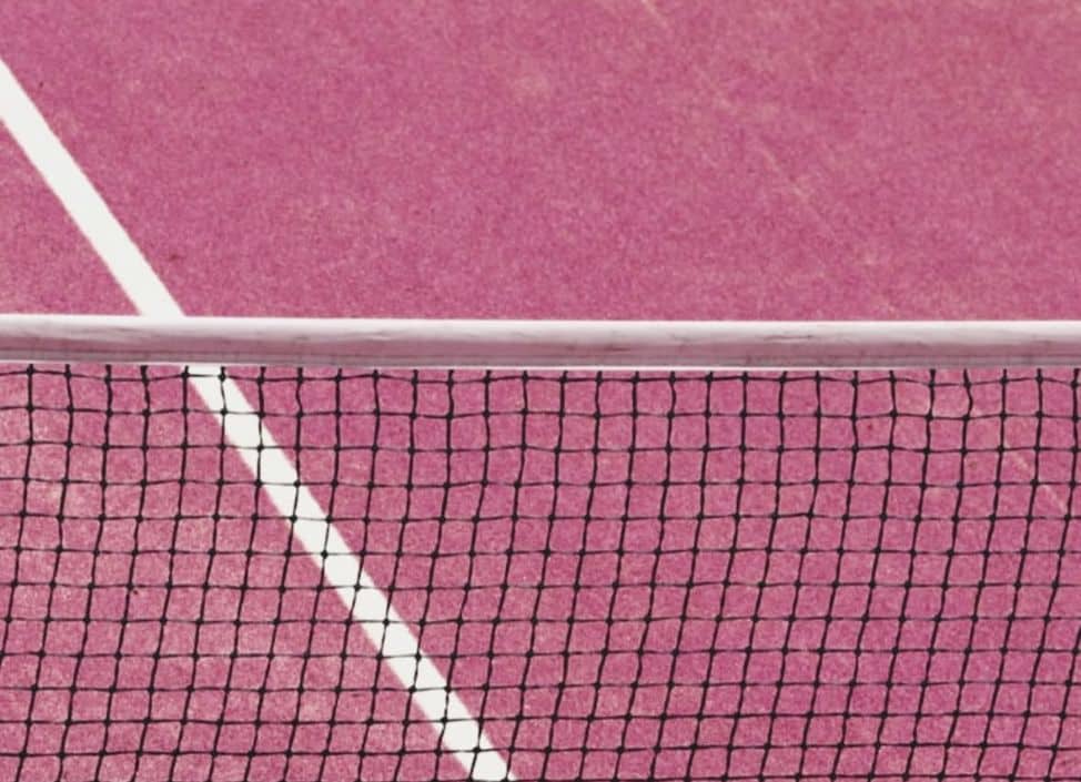 Close-up of pink padel court at The Ground in Uluwatu, Bali