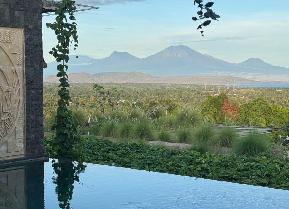 Ocean view from the hills at Sumberkima Hill Retreat in North Bali at sunset
