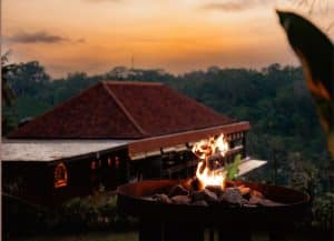 Dining at Chupacabras restaurant during sunset with a fire performance