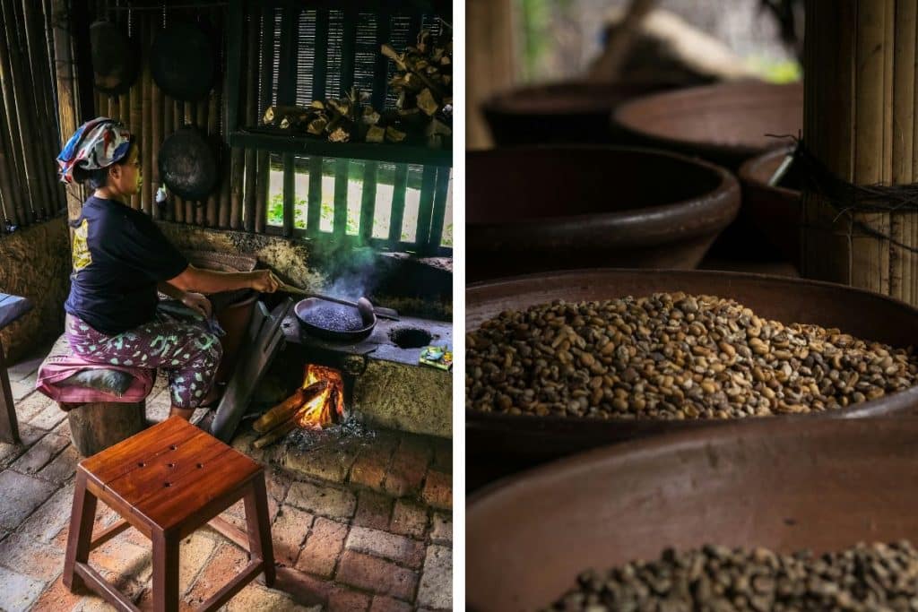 Hand holding a latte in a quiet outdoor café surrounded by greenery.
