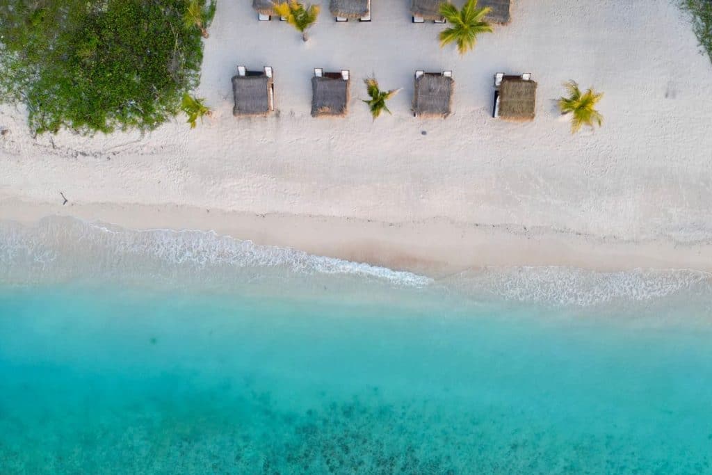 Crystal-clear waters and boats near the shore of Gili Trawangan, Lombok.