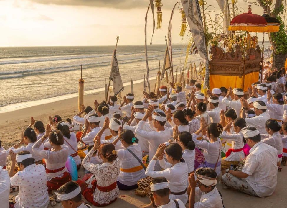 Nyepi ceremony performed on a Balinese beach