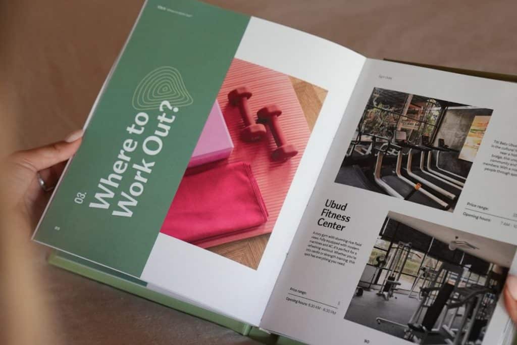 The Ubud Travel Guide open to show its inside content and layout