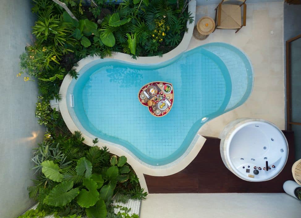 Jacuzzi inside the villa at Sini Vie Seminyak with warm ambient lighting.