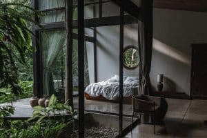 Brutalist interior at Zen River House in Ubud featuring raw concrete architecture, clean lines, and natural surroundings