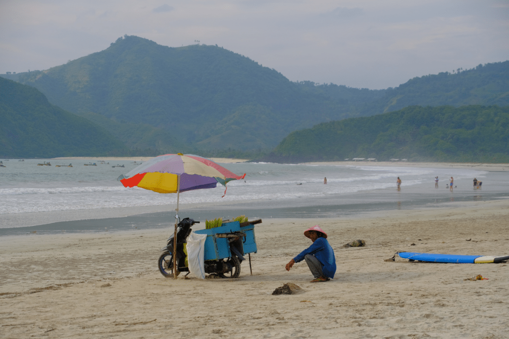 Sandy beach and turquoise water at Kuta Beach Lombok