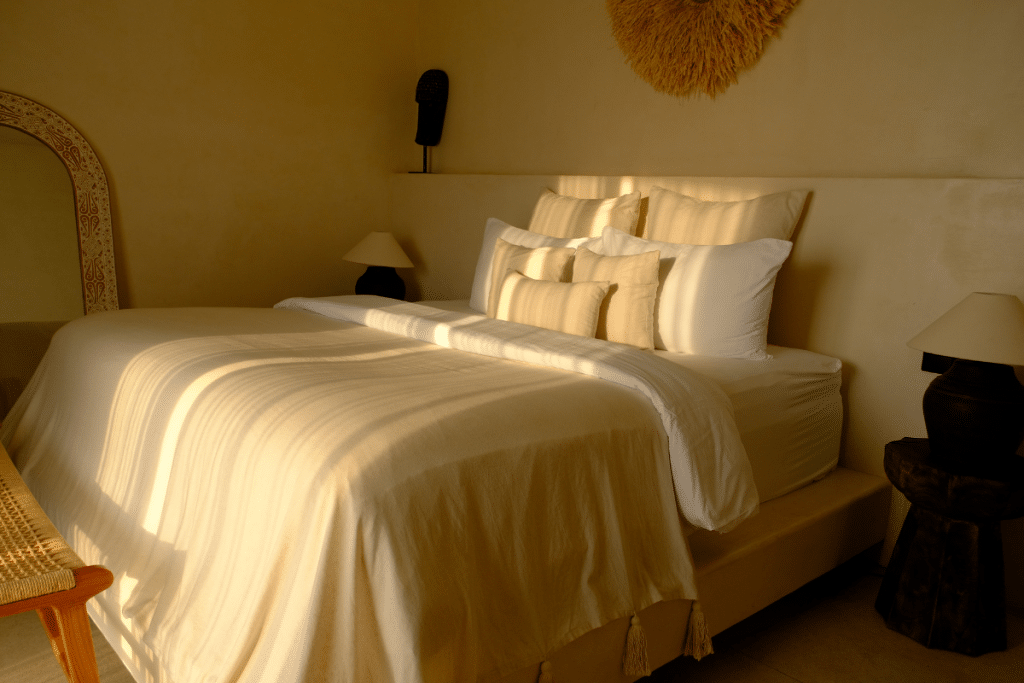 Bamboo bedroom with natural light at Mambo Lombok villa in Kuta Lombok