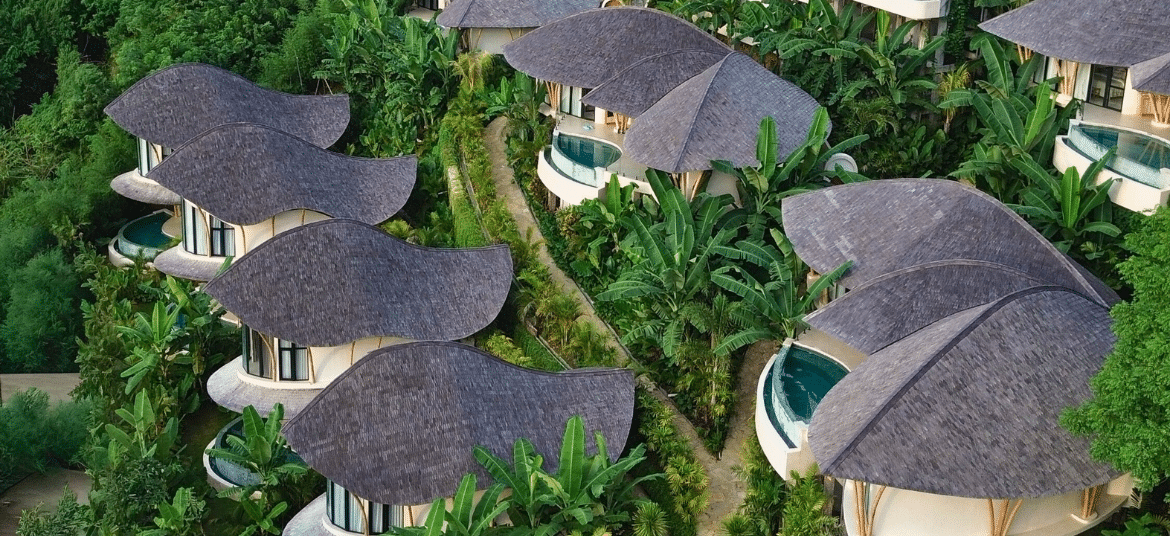 Aerial view of Mambo Lombok, a boutique bamboo villa retreat set above the jungle in Kuta Lombok.