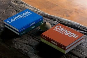 Linen coffee table books styled in a refined interior design setting