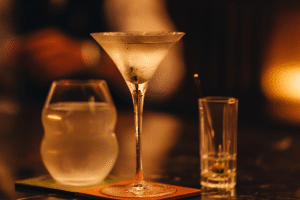 Canggu nightlife scene at sunset with beach club atmosphere and people gathering