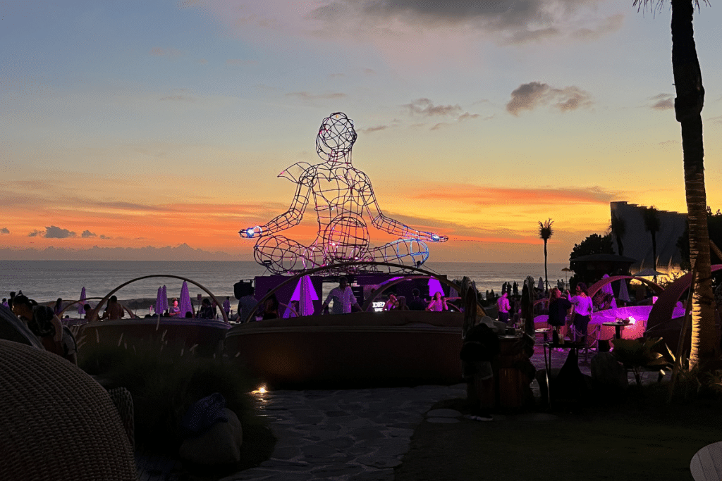 Luna Beach Club Bali sunset view with ocean and warm light