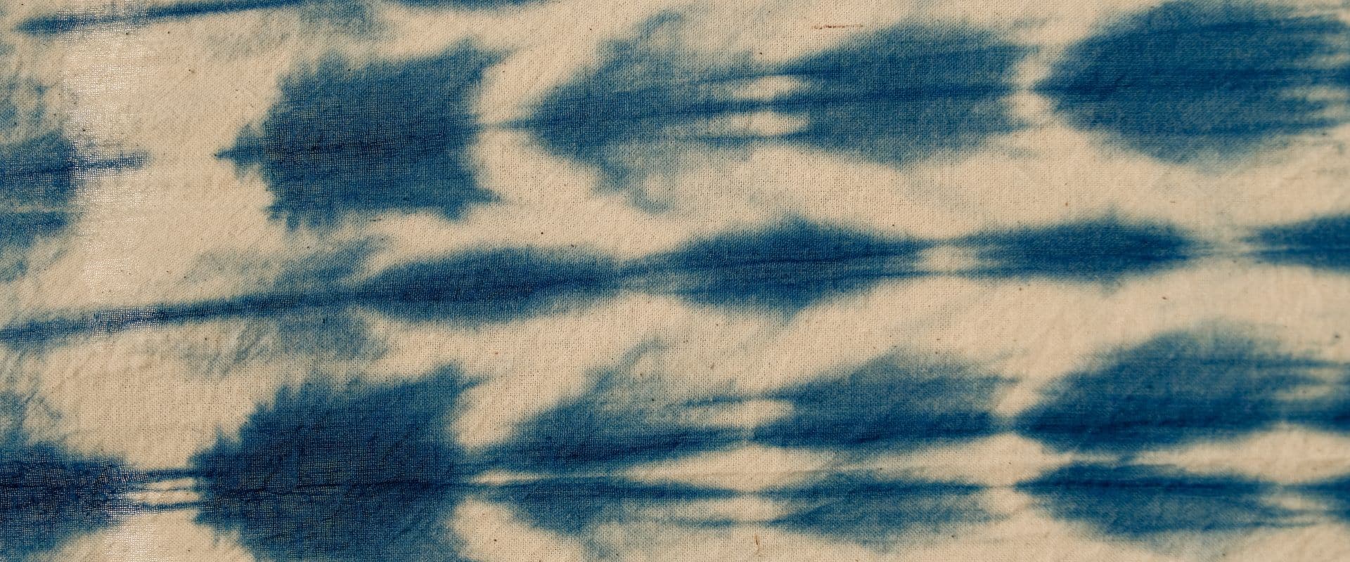 Indigo-dyed fabric with natural blue tones at Tian Taru