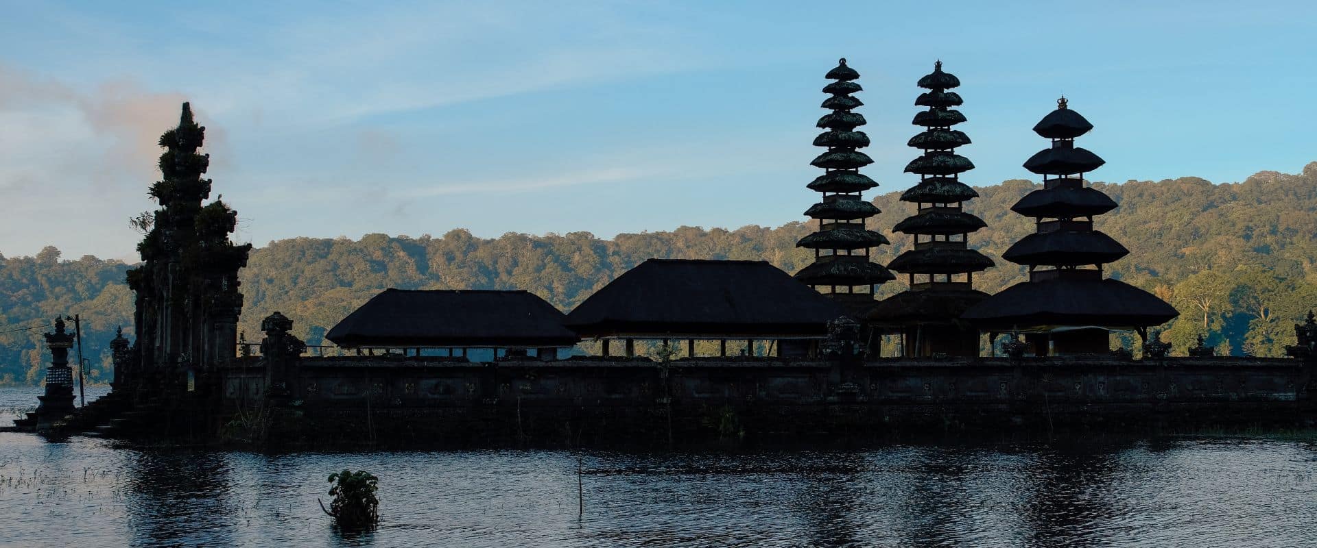 Ancient temple surrounded by forest near Lake Tamblingan in Bedugul, Bali
