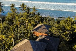 Aerial view of Lost Lindenberg Bali overlooking the Indian Ocean.