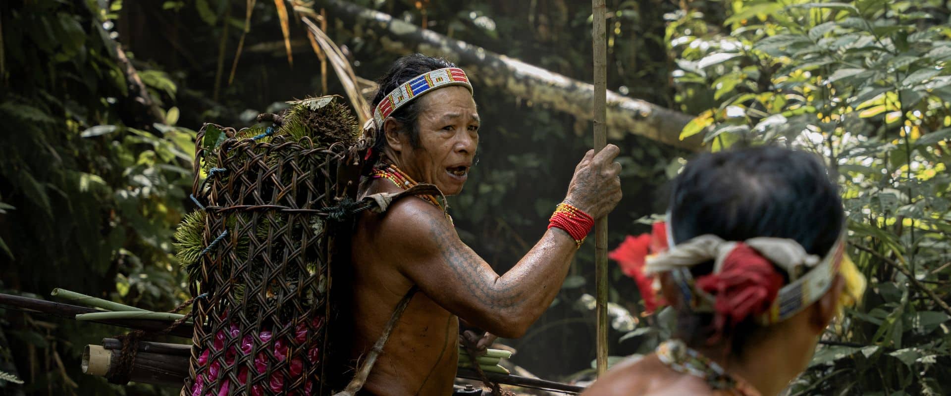 Two Mentawai Sikerei shamans talking on Siberut Island