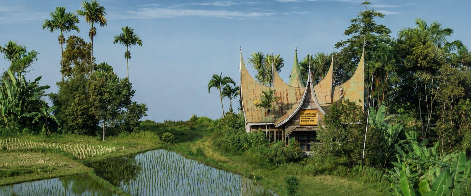 Lush mountains, forests and valleys stretching across the landscape of Sumatra.