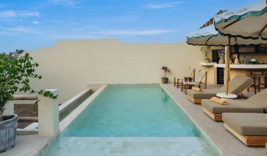 Bali Social Club outdoor swimming pool with lounge chairs