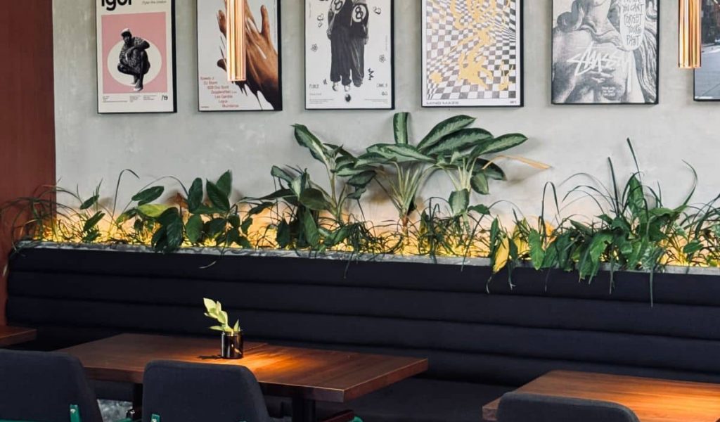 Interior view with wooden tables and tiled counter