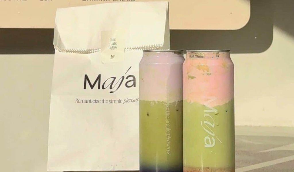 Matcha latte served at the outdoor bar of Maja Café.