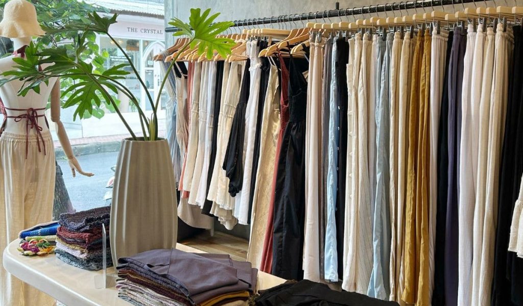 Mau store interior featuring minimalist fashion and neutral tones.