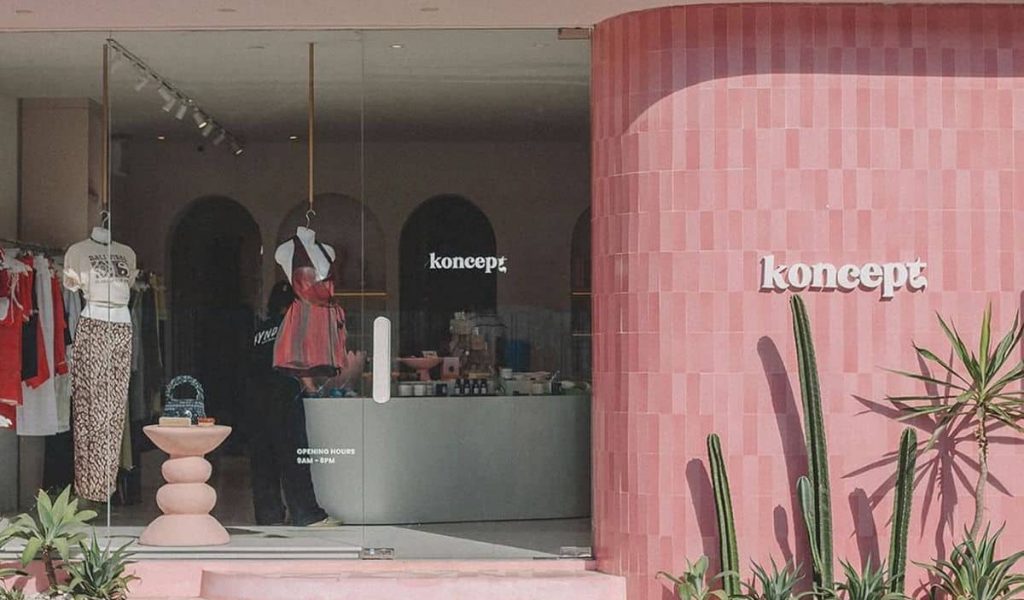Exterior view of the bright pink Koncept by Kynd boutique