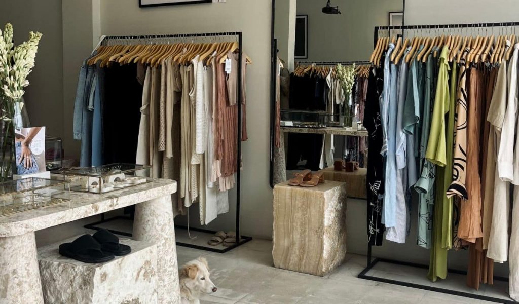 Parker store interior showcasing neutral-toned clothing and decor
