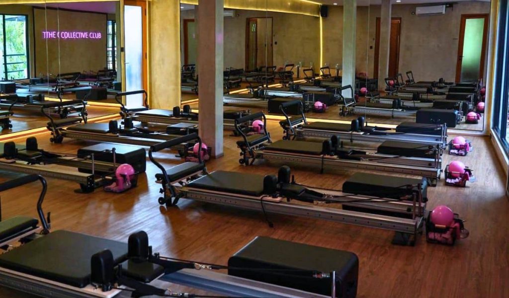 Sleek reformer Pilates room at The Collective Club in Ubud