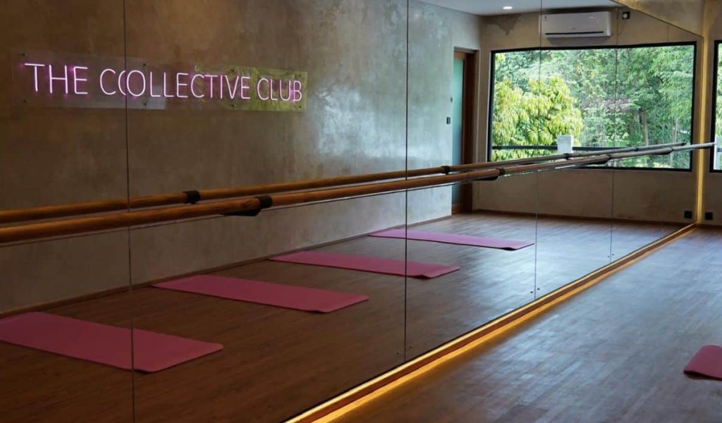 Mat Pilates studio with minimalist design at The Collective Club