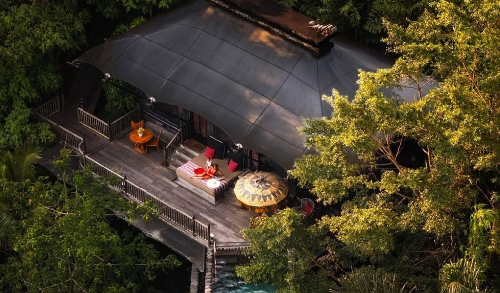Luxury tented retreat surrounded by lush rainforest at Capella Ubud in Bali