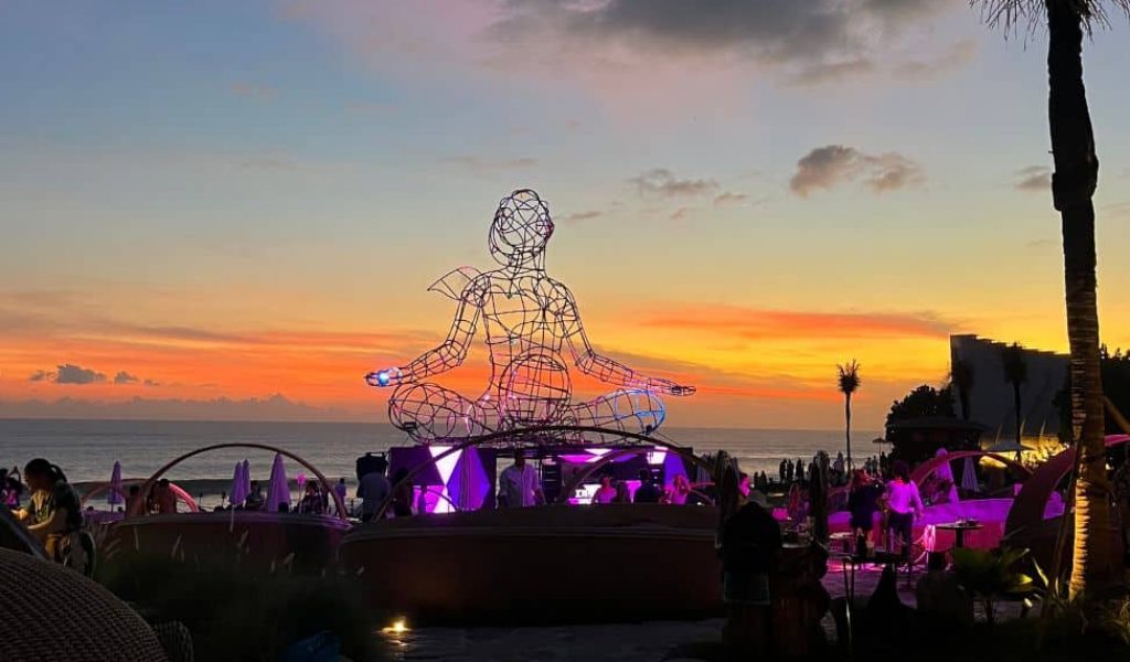 Sunset over the ocean at Luna Beach Club in Pererenan, Bali