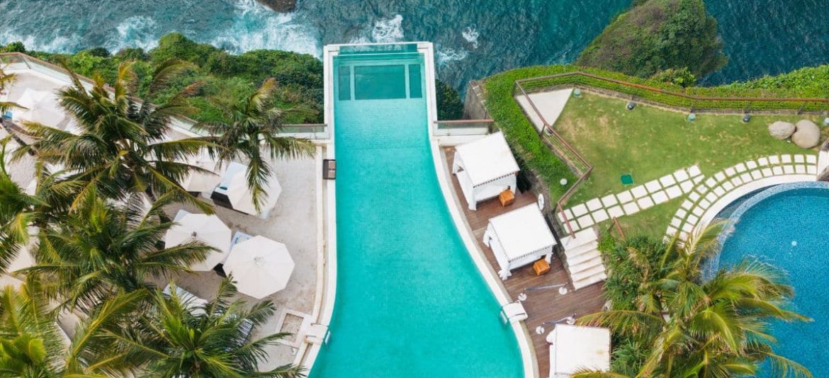 Oneeighty Uluwatu glass pool cliff ocean view Bali beach club