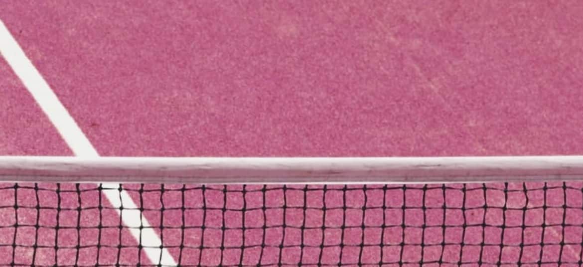 Close-up of pink padel court at The Ground in Uluwatu, Bali