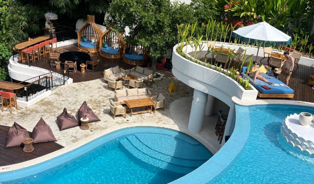 Tropical pool area surrounded by lush greenery at Tuju Tropical Lounge in Ubud