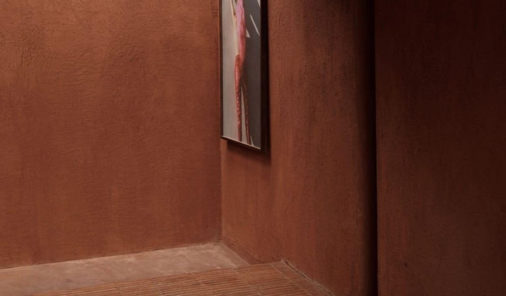 Interior design of Further Hotel blending raw textures and soft lighting