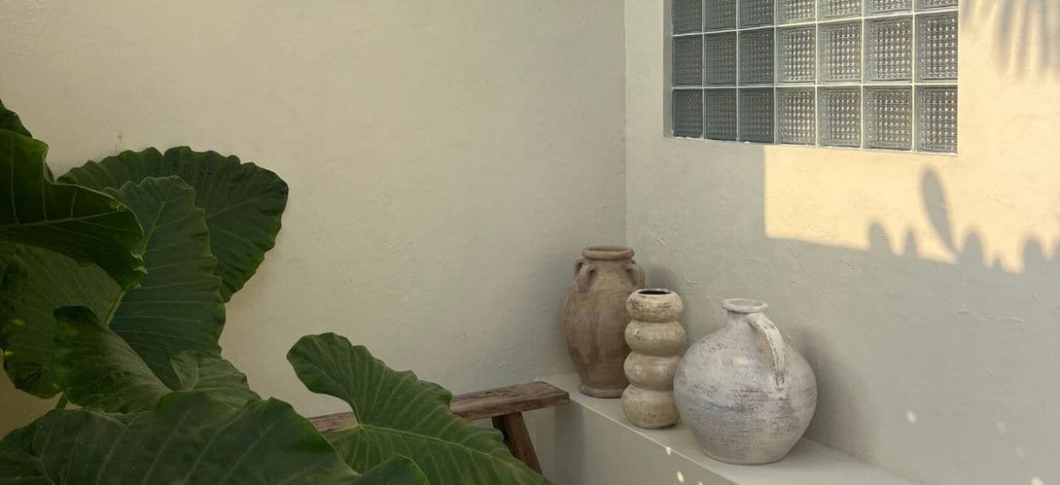 Outdoor area of Sol and Blue Villa with pool and bohemian décor