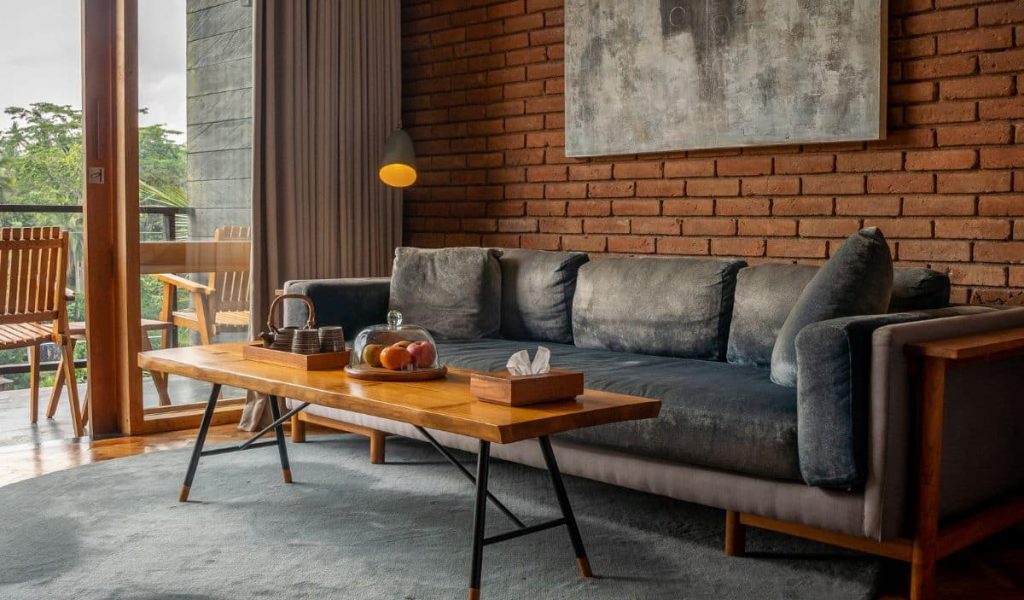 Stylish living room at Chapung Sebali with open views over the jungle in Ubud