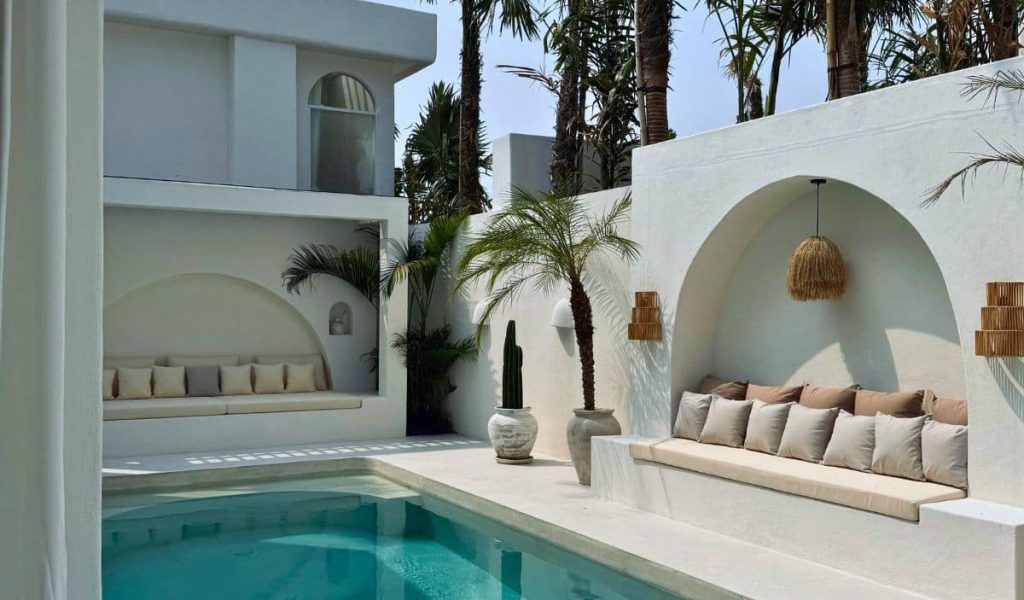 Modern outdoor pool area at Mazari Villas with minimalist design